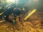 Archaeologists reveal secrets of artificial island older than Stonehenge in Scottish loch