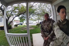 Moment Air Force officers storm ‘wrong house’ and hold child at gunpoint prompting investigation