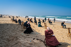 Exams on the beach: Israel laid waste to Gaza’s classrooms – now students sit on the sand