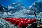 Mount Everest season opens late, with climbers undeterred by huge ice block and high travel costs