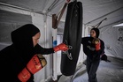 Palestinian girls train at a boxing club in Gaza, in photos