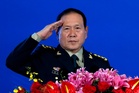 China gives suspended death sentences to 2 former defense ministers accused of bribery