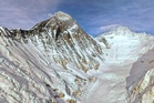 Photos show climbers attempting to scale Mount Everest despite increasing challenges