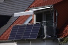 How do plug-in solar panels work and how are they installed?