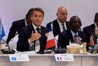 Macron interrupts speaker to ask for silence in awkward moment
