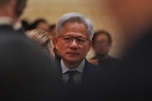 Nvidia CEO Jensen Huang tries Beijing's 'zhajiangmian' on food tour