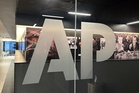 AP begins implementing layoffs of US-based journalists, part of a pivot away from print journalism