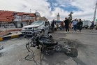 Blast outside a Syrian defense ministry building kills a soldier, wounds 12 people
