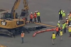 Sinkhole forces canceled flights and delays at one of New York’s biggest airports as runway is shut down