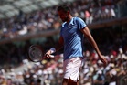 Former US Open champion loses to teenager in history-making match at Roland Garros