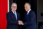 Starmer hails ‘generational uplift’ as he signs defence pact with Poland’s Tusk