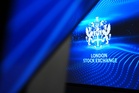 FTSE 100 edges up and oil sinks amid peace optimism