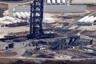 Public warned to avoid Blue Origin rocket debris as photos reveal damage at explosion site