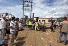 Rescuers dig for bodies after a mining explosives blast in Myanmar kills at least 43