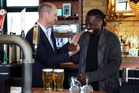 Prince William spotted pulling pints behind the bar at south London pub