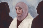 A Yazidi tells an Australian court she was enslaved and raped in an IS home in Syria