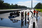 Refilling starts for newly painted Reflecting Pool in Washington, in photos