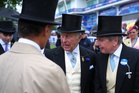 King and Queen make 100-mile helicopter dash from royal wedding to watch horse racing