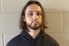 Thousands of homes gone, 12 lives lost— Now the accused goes on trial