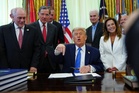 Trump reminded to sign bill after nearly ending Oval Office ceremony