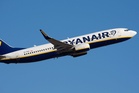 Ryanair investigated over charging parents to sit with their children on flights