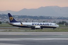 Ryanair investigated for charging parents £8 to sit with their children on flights