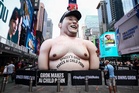 Giant inflatable Elon Musk appears in Times Square ahead of SpaceX IPO