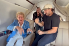 Rod Stewart parties on private jet on way to watch Scotland in World Cup after cancelling show