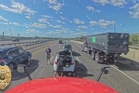 Two road rage drivers stop in middle of busy interstate to fight