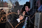 Photos of ultra-Orthodox Jews protesting military conscription in Israel