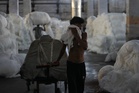 Climate-driven heat in India’s textile factories stifles workers but coolers and ventilation help