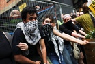Protesters clash outside Oxford Union ahead of Tommy Robinson debate