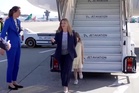 Giorgia Meloni’s camera-shy daughter hides behind mother as pair arrive for G7 summit