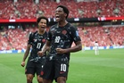 Jonathan David's hat trick propels Canada to its first World Cup win, 6-0 over Qatar