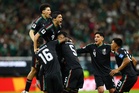 Mexico become first country in World Cup knockout rounds with narrow win over South Korea