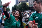 Rescue dog Osito steals hearts at the World Cup, one bike ride at a time