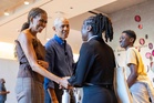 Barack and Michelle Obama make surprise appearance at opening of presidential center