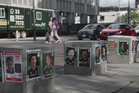 With World Cup in Guadalajara, families of Mexico's disappeared turn loved ones into soccer stickers