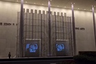 Guerrilla artists declare war on Trump with crocodile Hegseth, vampire Miller and ‘86 47’ projected on DC landmarks