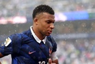 France vs Iraq LIVE: Kylian Mbappe goal gives way to weather delay with restart time up in the air