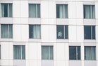 Gunman kills a Montreal officer at a Hilton hotel before being shot dead, police say