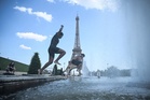 Heatwave grips Europe with at least 20 people dead in France as temperatures hit 43C
