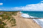 Woman dies on beach in Dorset as 40C heatwave grips UK