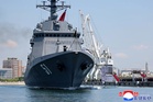 North Korea's Kim claims progress on nuclear-armed navy as new warship is placed into service