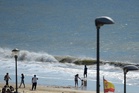 What are beach ‘smart showers’ and why are they causing controversy in Spain?