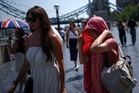 UK heatwave live: Critical incidents declared at three hospitals as country could face hottest June night on record