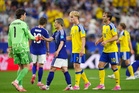 Japan and Sweden secure World Cup knockout places after 1-1 draw