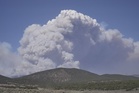 Dangerous weather hampers firefighters and leads to fireworks bans in western US