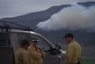 Fast-moving wildfire spreads through western US as restrictions put in place