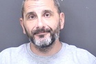 International manhunt for British man after woman’s body discovered in suitcase